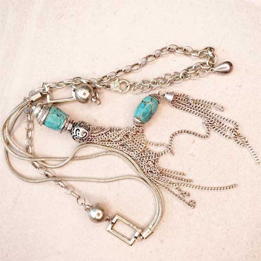 Long Turquoise coloured Silver Pendant